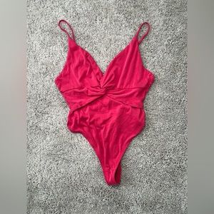 Urban Outfitters Pink backless bodysuit